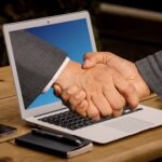 handshake, hands, laptop-3382504.jpg